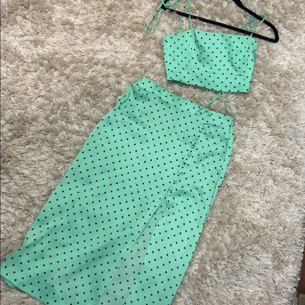 Two piece set. Mint green polka dot skirt and crop